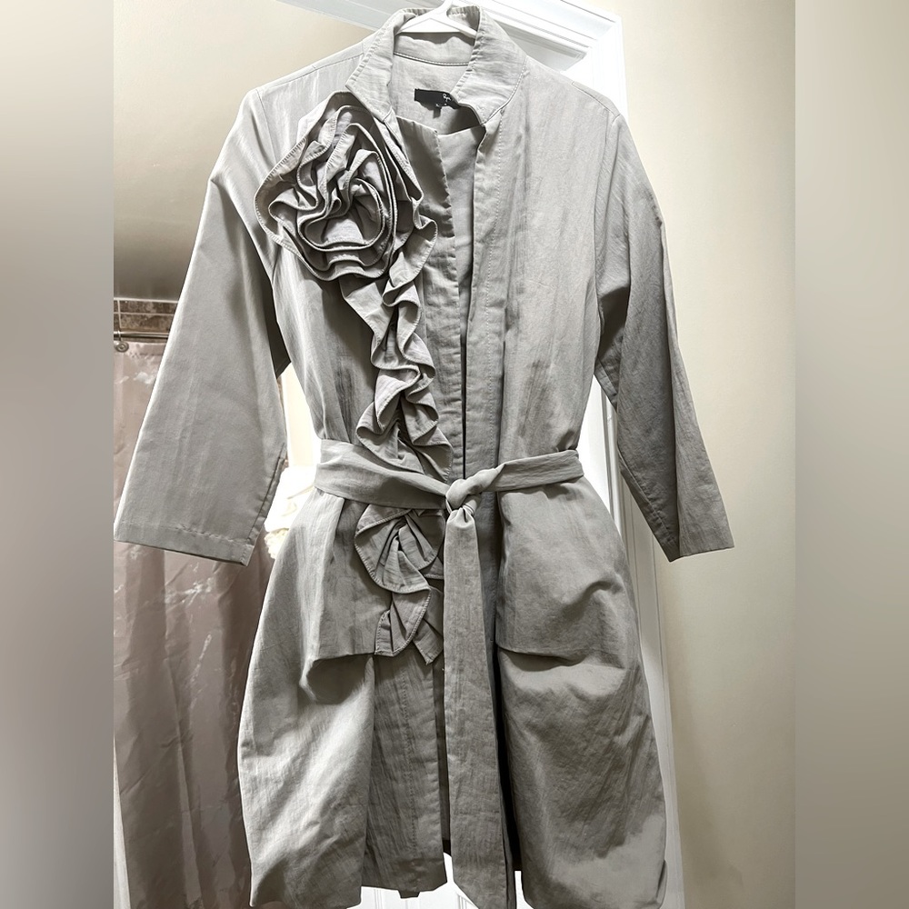 Khaki belted jacket.